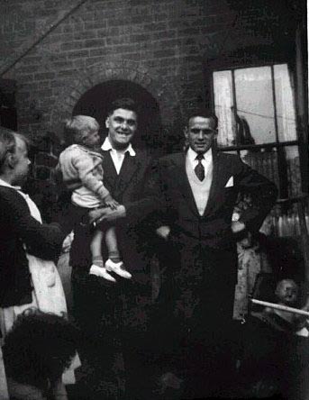 Diane Morris, John colin being held by Ronnie colin, Roly Morris, 25, clarendon Street, circa 1958